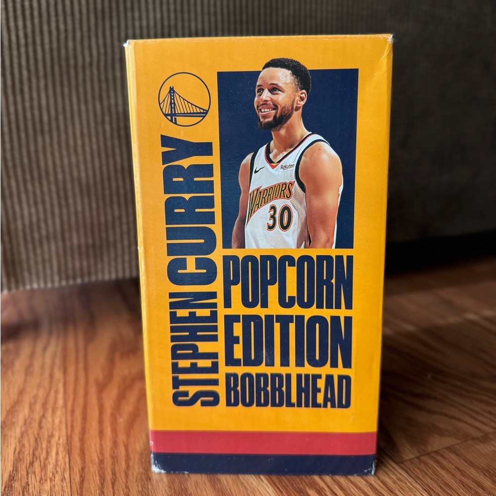 Brand new and never opened Golden State Stephen Curry Popcorn Edition bobblehead